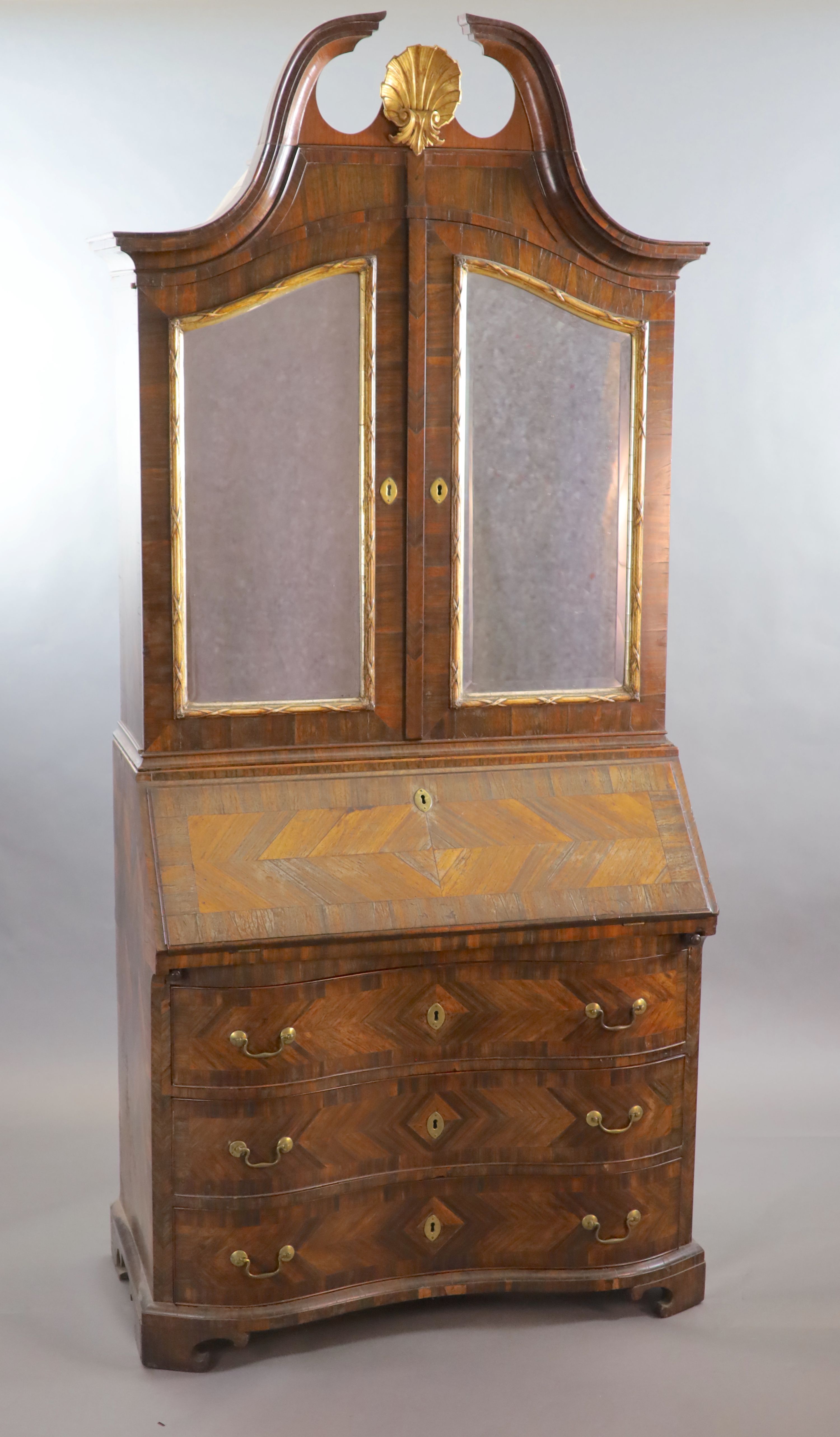 A mid 18th century Italian rosewood parquetry and parquetry bureau bookcase, W.107cm D.57cm H.237cm.